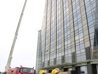 Fire personnel are conducting a firefighting drill at the scene of a high-rise building in Lianyungang, Jiangsu province, China, on August 1...