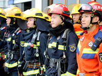 Fire personnel are conducting a firefighting drill at the scene of a high-rise building in Lianyungang, Jiangsu province, China, on August 1...