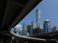 Pedestrians are riding on the streets of the CBD in Beijing, China, on August 14, 2024. (