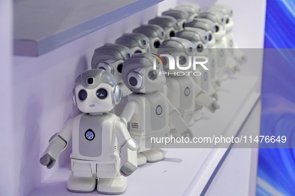 Humanoid robots are being displayed at a science popularization event in Yantai, China, on August 13, 2024. International investment bank Go...