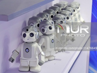 Humanoid robots are being displayed at a science popularization event in Yantai, China, on August 13, 2024. International investment bank Go...