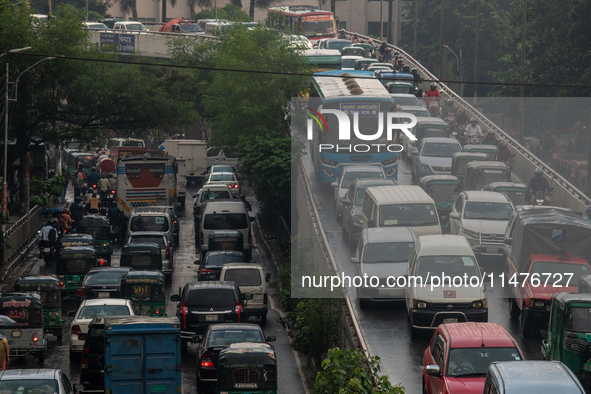 Vehicles are being seen stuck in traffic during rush hour in Dhaka, Bangladesh, on August 13, 2024. 