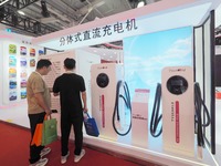 Visitors are visiting the ''Split DC Charger'' at the 2024 Beijing International Charging Pile and Converter Exhibition in Beijing, China, o...