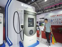 Visitors are visiting the ''Integrated DC Charging pile'' at the 2024 Beijing International Charging Pile and Power Station Exhibition in Be...