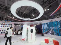 Visitors are visiting the ''Integrated DC Charger'' at the 2024 Beijing International Charging Pile and Converter Exhibition in Beijing, Chi...