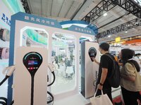 Visitors are visiting the ''Supercharged Liquid Cooling Terminal'' at the 2024 Beijing International Charging Pile and Power Station Exhibit...