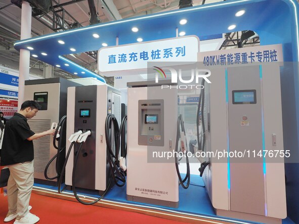 Visitors are visiting the ''DC Charging pile'' at the 2024 Beijing International Charging Pile and Converter Exhibition in Beijing, China, o...