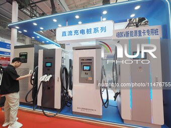 Visitors are visiting the ''DC Charging pile'' at the 2024 Beijing International Charging Pile and Converter Exhibition in Beijing, China, o...