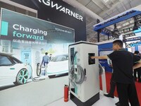 Visitors are visiting the ''DC Fast Charger'' at the 2024 Beijing International Charging Pile and Converter Exhibition in Beijing, China, on...