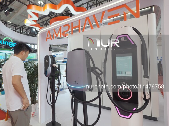 Visitors are visiting the ''Smart Charging Pile'' at the 2024 Beijing International Charging Pile and Power Station Exhibition in Beijing, C...