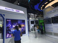 Visitors are visiting the stand of Tencent at the World Artificial Intelligence Conference 2024 in Shanghai, China, on July 4, 2024. On Augu...