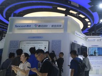 Visitors are visiting the stand of Tencent at the World Artificial Intelligence Conference 2024 in Shanghai, China, on July 4, 2024. On Augu...