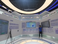 Visitors are visiting the stand of Tencent at the World Artificial Intelligence Conference 2024 in Shanghai, China, on July 4, 2024. On Augu...