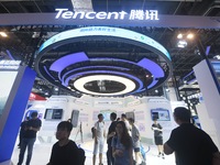 Visitors are visiting the stand of Tencent at the World Artificial Intelligence Conference 2024 in Shanghai, China, on July 4, 2024. On Augu...