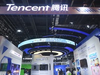 Visitors are visiting the stand of Tencent at the World Artificial Intelligence Conference 2024 in Shanghai, China, on July 4, 2024. On Augu...