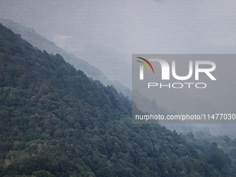 A general view of the mountains is showing rain in Bergamo, Italy, on August 13, 2024 (