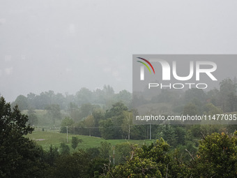 A general view of the mountains is showing rain in Bergamo, Italy, on August 13, 2024 (