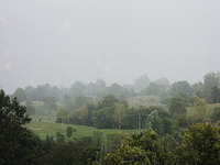 A general view of the mountains is showing rain in Bergamo, Italy, on August 13, 2024 (