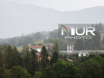 A general view of the mountains is showing rain in Bergamo, Italy, on August 13, 2024 (