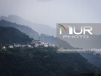 A general view of the mountains is showing rain in Bergamo, Italy, on August 13, 2024 (