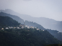 A general view of the mountains is showing rain in Bergamo, Italy, on August 13, 2024 (