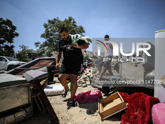 Commercial structures and animal shelters in the area are being demolished as Israeli forces conduct a raid in the At-Tur neighborhood of Ea...