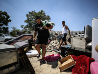 Commercial structures and animal shelters in the area are being demolished as Israeli forces conduct a raid in the At-Tur neighborhood of Ea...