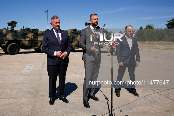 (L-R) Secretary of State in the Ministry of Defence of Poland, Pawel Bejda,  Deputy Prime Minister and Minister of Defence of Poland, Wladys...