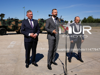 (L-R) Secretary of State in the Ministry of Defence of Poland, Pawel Bejda,  Deputy Prime Minister and Minister of Defence of Poland, Wladys...