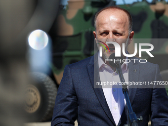 Pawel Matenczuk speaks to media during a ceremony of signing a contract to buy light armour vehicles for the Polish army in 1st Warsaw Armou...