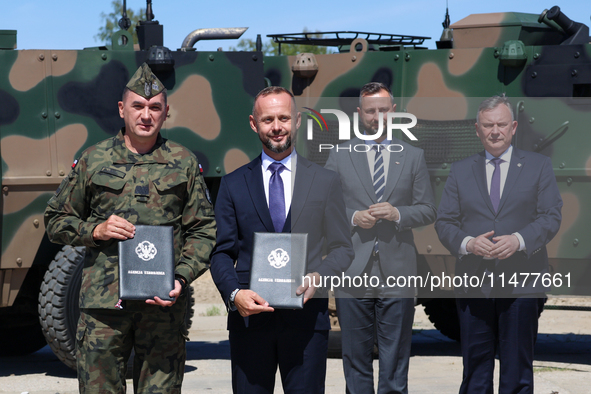 (L-R) General Artur Kuptel, Pawel Matenczuk attend hold signed contract as Deputy Prime Minister and Minister of Defence of Poland, Wladysla...