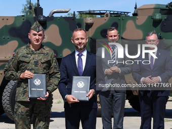 (L-R) General Artur Kuptel, Pawel Matenczuk attend hold signed contract as Deputy Prime Minister and Minister of Defence of Poland, Wladysla...