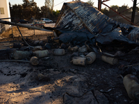 Gas cylinders are exploding in a lumber warehouse in the Vrilissia area, due to the fire that is breaking out in Athens, Greece, on August 1...