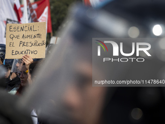 A poster is displaying the legend: ''Essential: increase the educational budget.'' during a protest of Education Workers' Union in Buenos Ai...