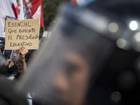 A poster is displaying the legend: ''Essential: increase the educational budget.'' during a protest of Education Workers' Union in Buenos Ai...