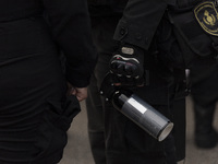 The Federal Police are holding pepper gas in their hand during a protest of Education Workers' Union in Buenos Aires, Argentina, on August 1...