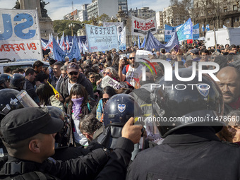 Federal Police are firing pepper spray at teachers who are demanding salary improvements  during a protest of Education Workers' Union in Bu...