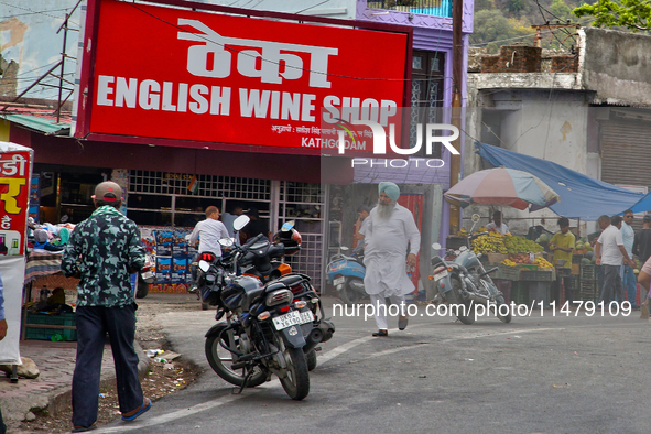 A busy street is bustling in Kathgodam, Uttarakhand, India, on April 21, 2024. Kathgodam is a suburb of Haldwani city in the Nainital distri...