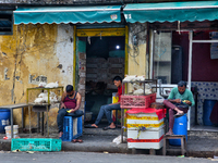 Men are selling chicken in Kathgodam, Uttarakhand, India, on April 21, 2024. (