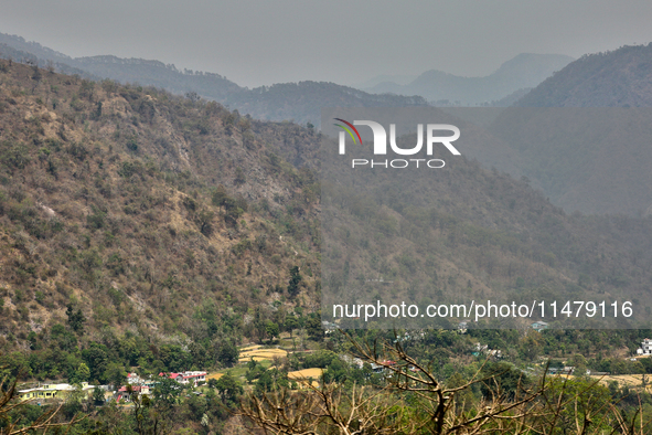 A mountainous landscape is appearing in Kathgodam, Uttarakhand, India, on April 21, 2024. Kathgodam is a suburb of Haldwani city in the Nain...