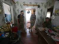 Servicemen of the 24th King Daniel of Galicia Separate Mechanized Brigade are resting during a break between combat missions near Chasiv Yar...