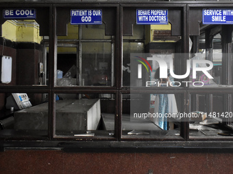 A junior doctor is taking photos with her mobile in the vandalized emergency ward at R.G. Kar Medical College and Hospital in Kolkata, India...