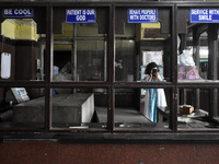 A junior doctor is taking photos with her mobile in the vandalized emergency ward at R.G. Kar Medical College and Hospital in Kolkata, India...