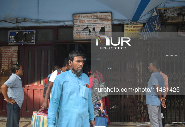 People are standing outside of the emergency ward of R G Kar Medical College in Kolkata, India, on August 15, 2024. 