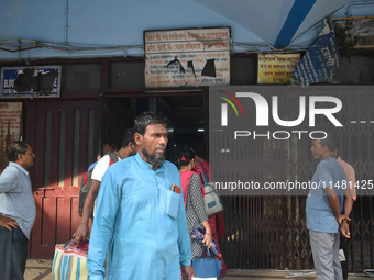 People are standing outside of the emergency ward of R G Kar Medical College in Kolkata, India, on August 15, 2024. (