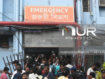 Media persons are standing outside of the emergency ward of R G Kar Medical College in Kolkata, India, on August 15, 2024. (