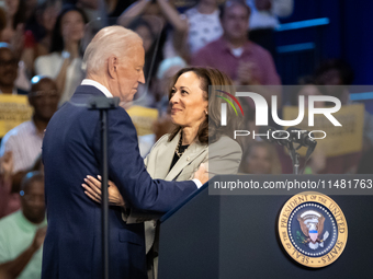 Vice President Kamala Harris embraces President Joe Biden after introducing him at an event announcing reduced Medicare prices for ten widel...