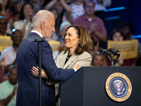 Vice President Kamala Harris embraces President Joe Biden after introducing him at an event announcing reduced Medicare prices for ten widel...