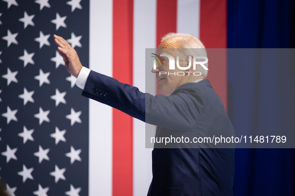 President Joe Biden waves to supporters after he and Vice President Kamala Harris announced reduction of Medicare prices for ten widely-used...