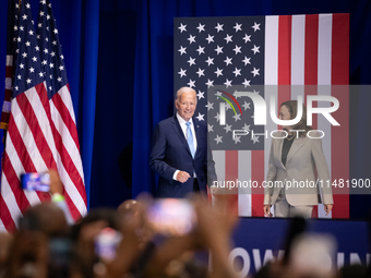 President Joe Biden and Vice President Kamala Harris arrive on stage to raucous applause as they announce reduced Medicare prices for ten wi...